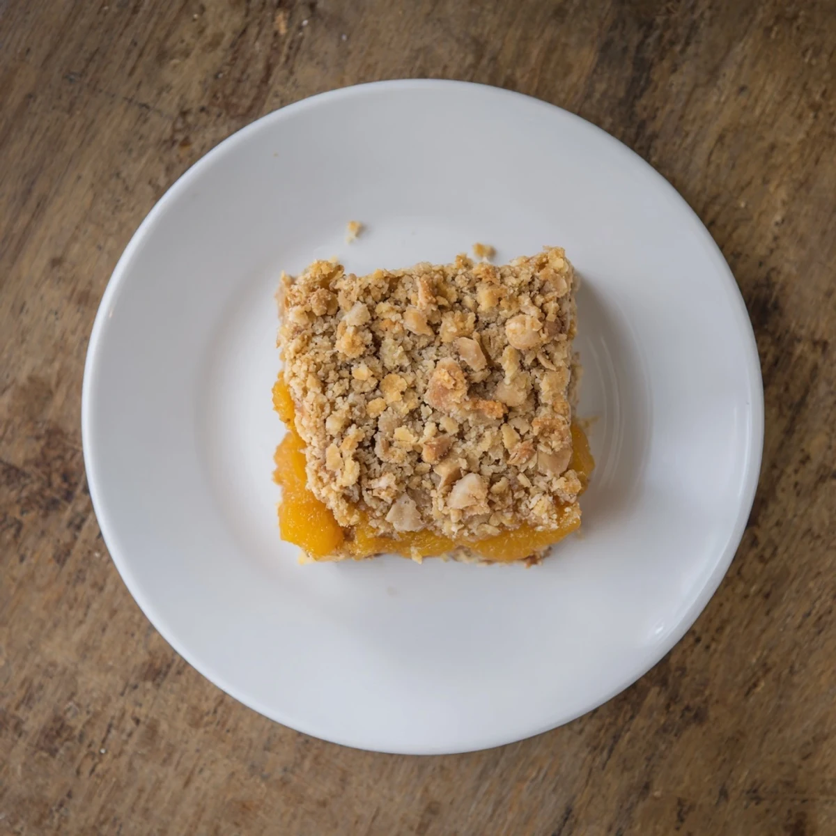 Sliced gluten-free oatmeal apricot bars showcasing layers of oats and sweet dried apricots
