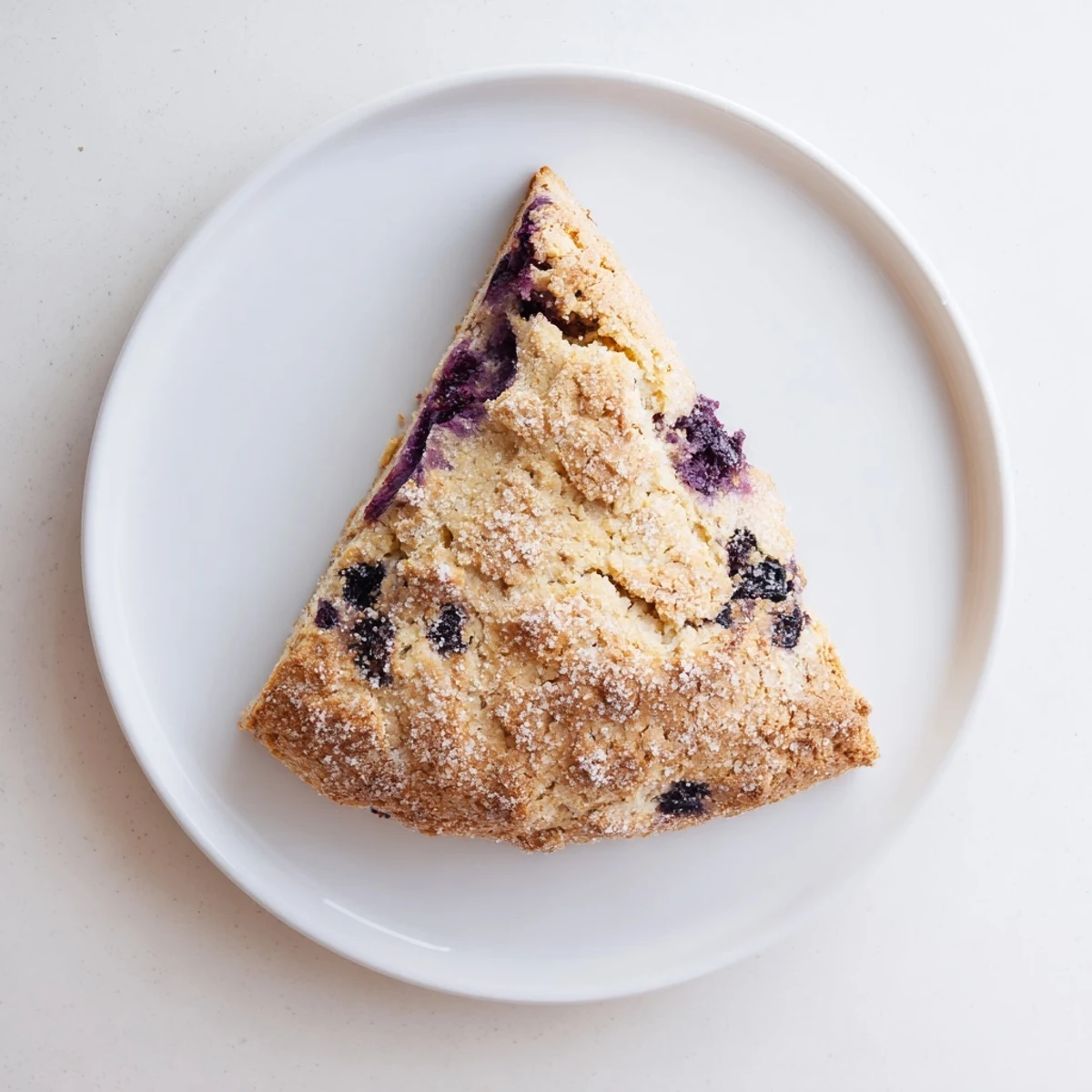 Freshly baked triangular pastries with bursting blueberries and warm Vietnamese cinnamon flavor