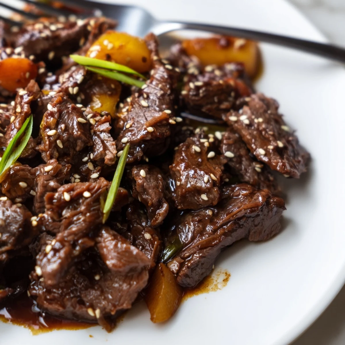 Slow-cooked Korean style pot roast featuring fall-apart beef with carrots and daikon in rich sauce