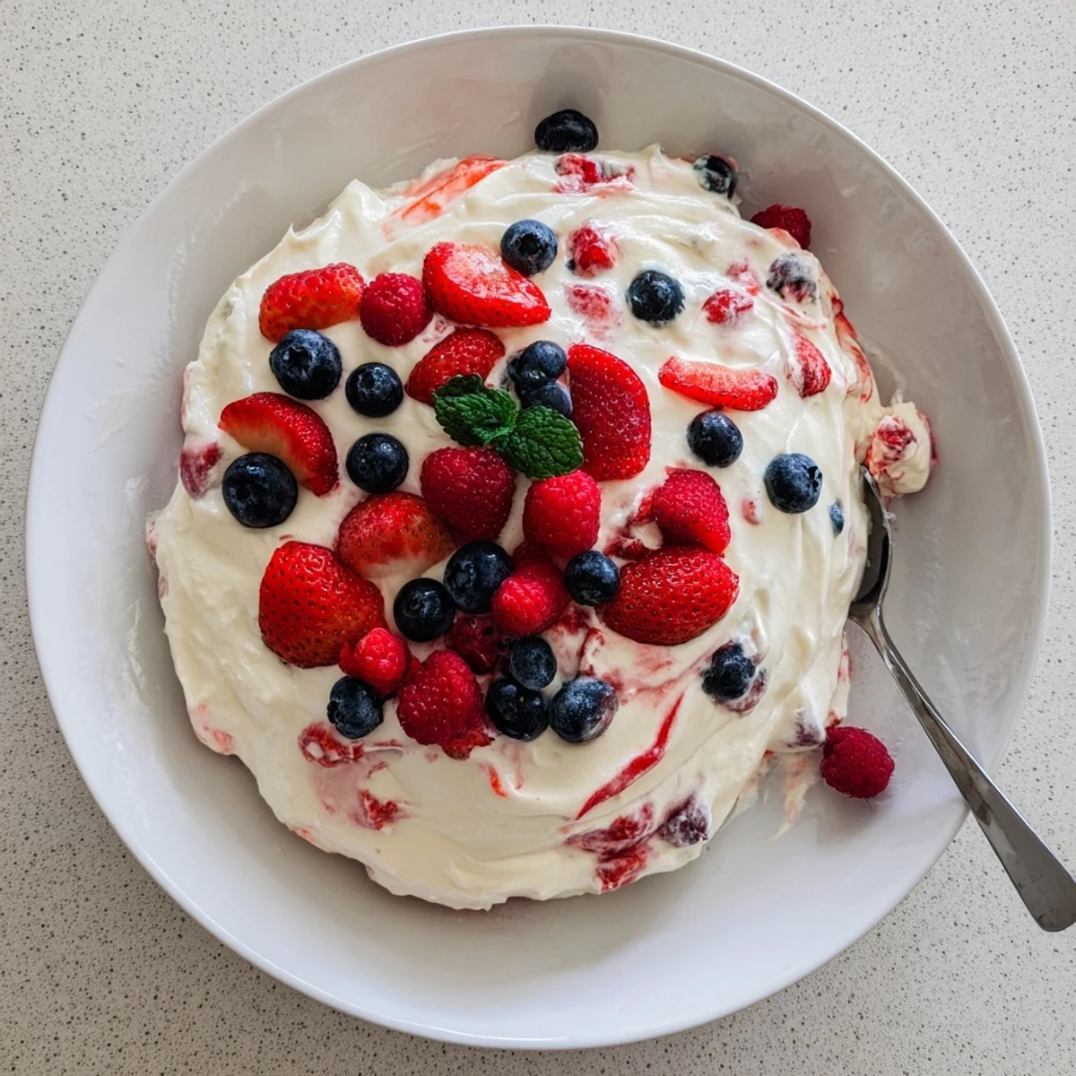 Red White Blue Cheesecake Salad: creamy, fluffy mixture studded with juicy berries